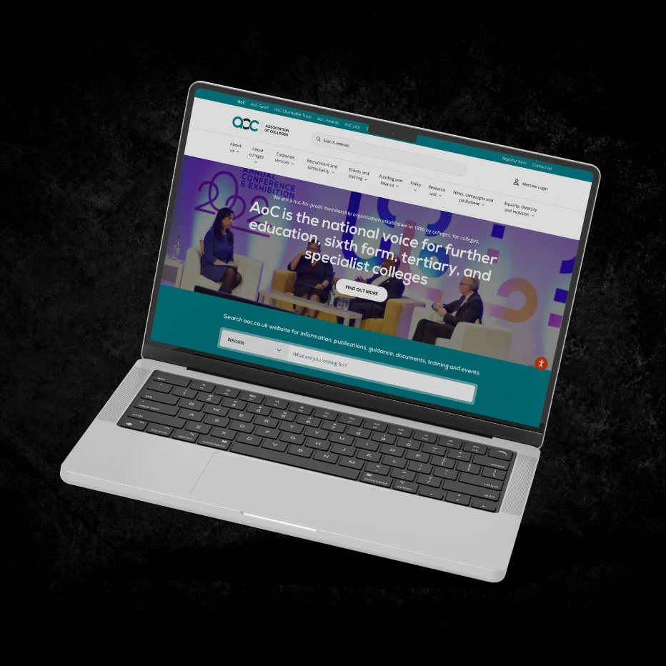 AoC website on laptop